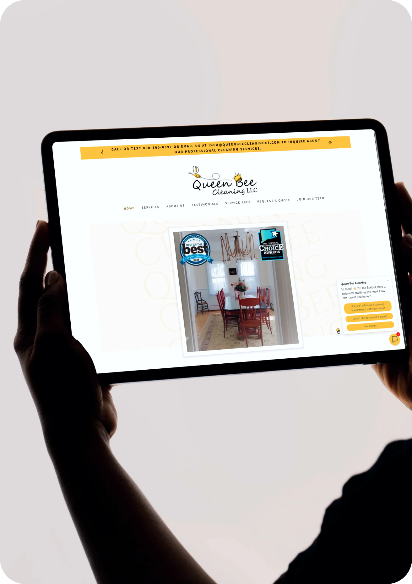Queen Bee Cleaning app on a tablet